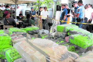 Authorities take stock of a huge shipment of illegal drugs flagged at a checkpoint in Alitagtag, Batangas province, April 15, 2024, weighing 1,400 kilos valued at P9.68 billion, the biggest drug seizure thus far under the Marcos administration (ctto).